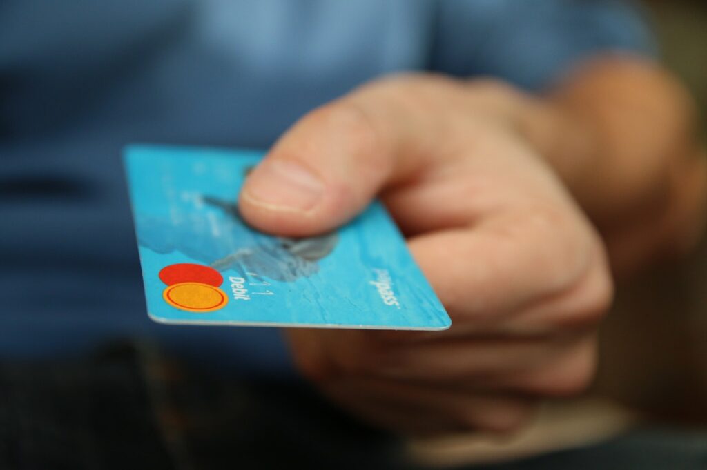 credit card in a persons hand represensting credit card fraud in nevada