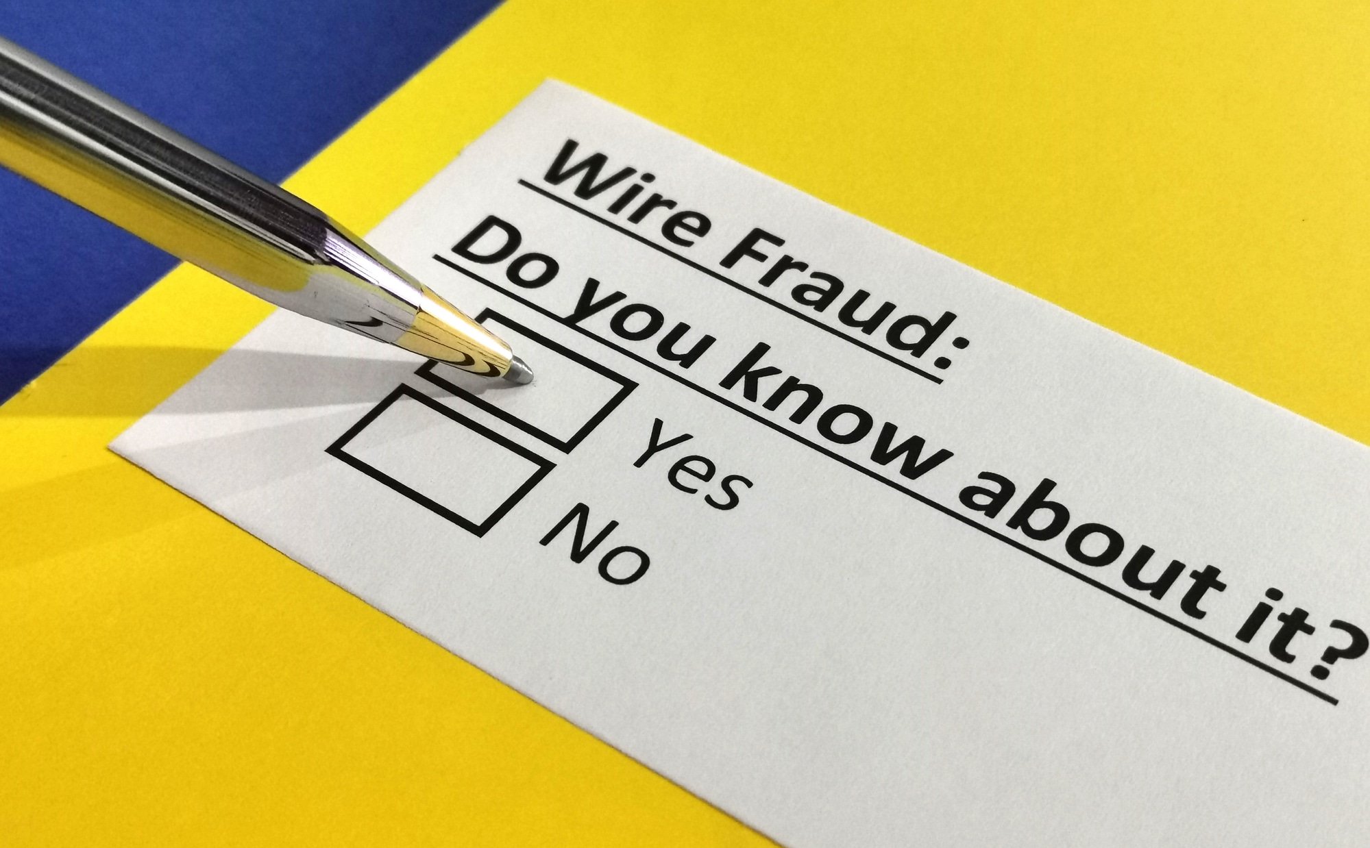 One person is answering question about wire fraud,